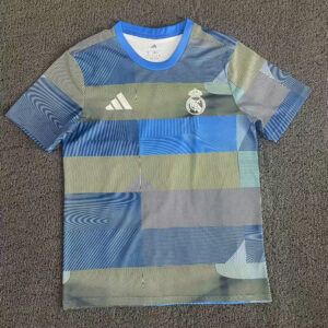 Camiseta Real Madrid entrenamiento azul y gris 2025 2026 vista frontal